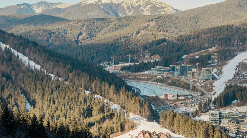 A winter view across Bukovel in the Ukrainian Carpathians, with mountains and the resort below