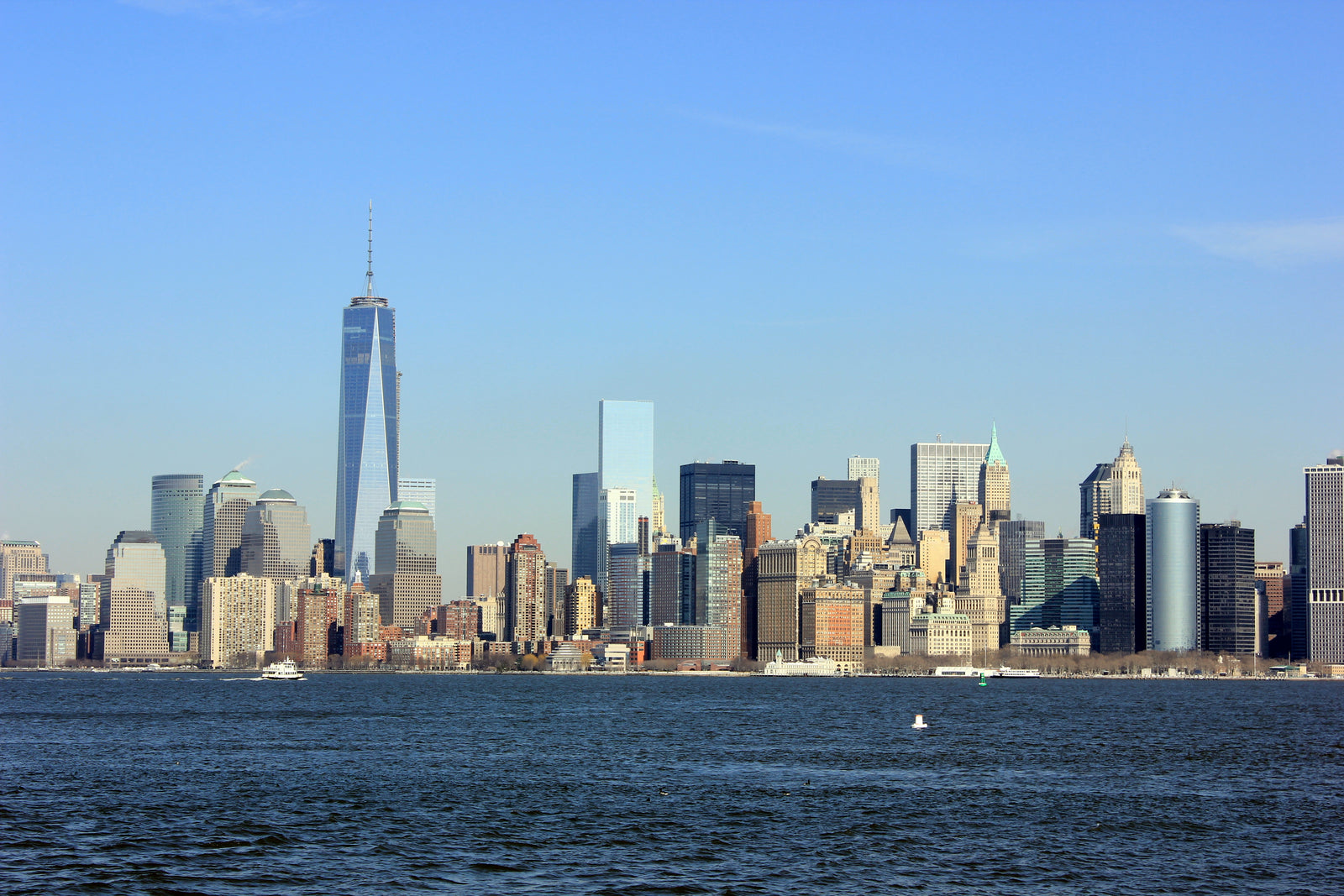 Lower Manhattan skyline and One World Trade Center across the water, photographed in 2014
